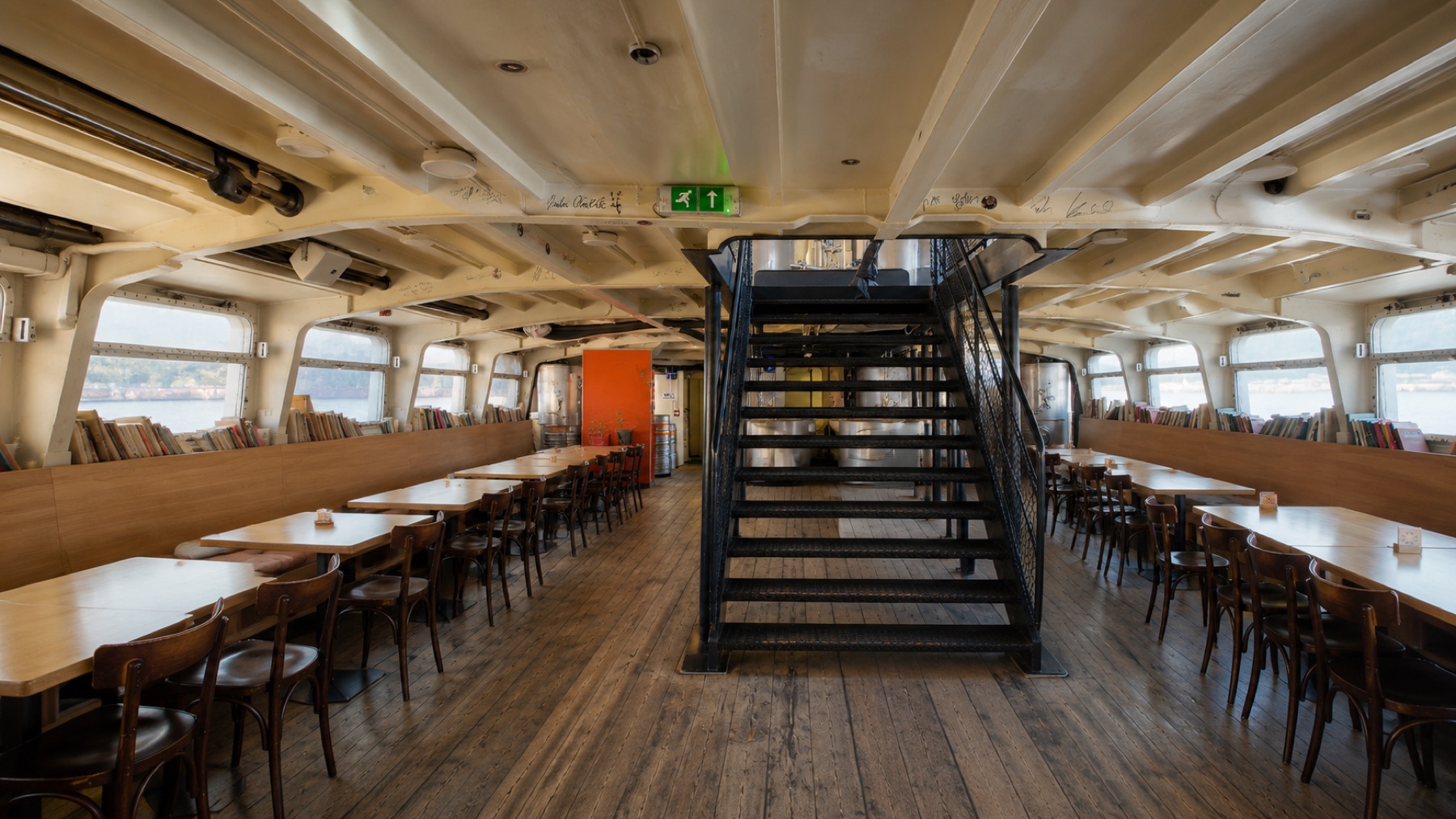 Lower dining deck with tables