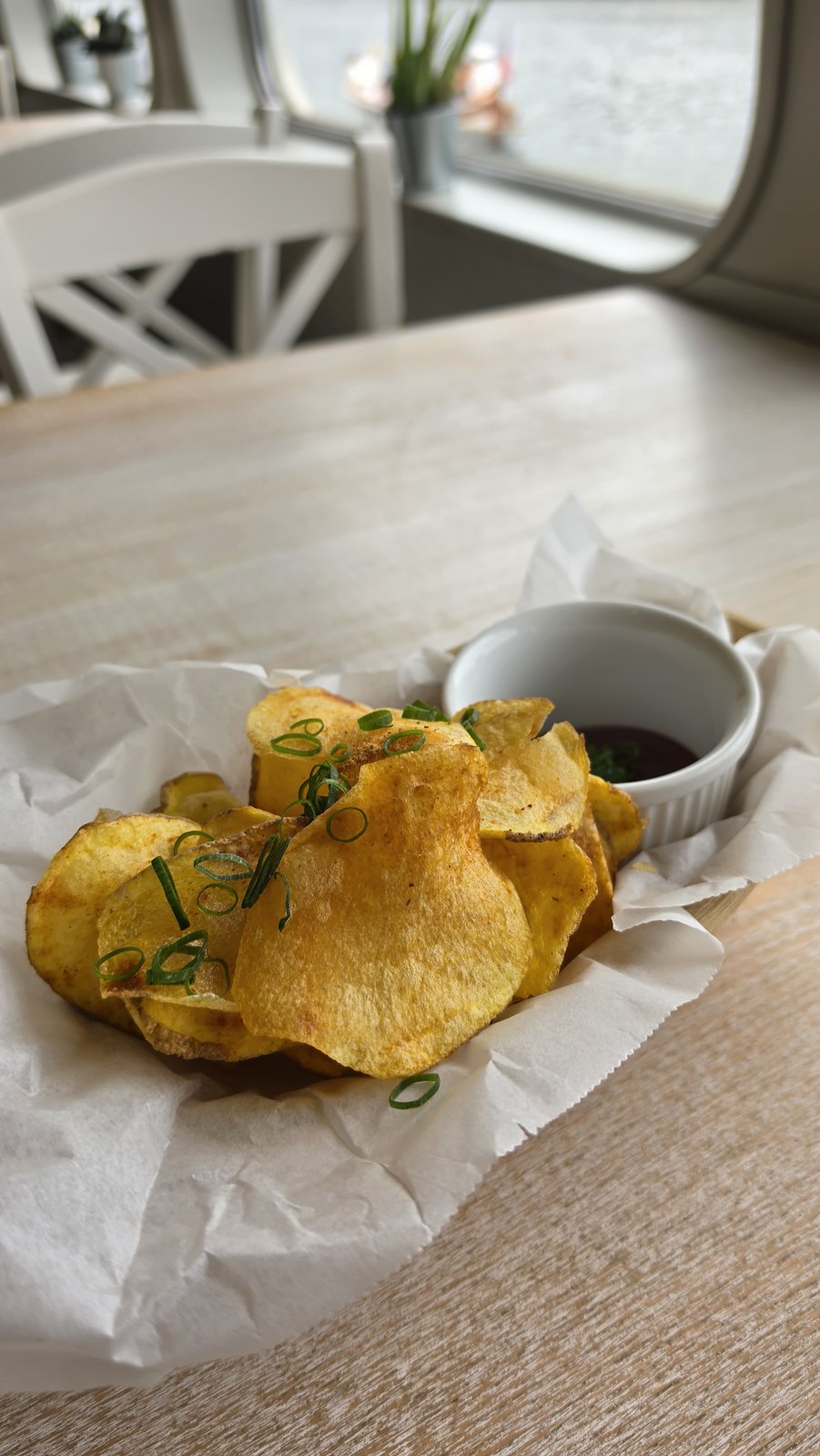 KVASOUL potato chips by the river window